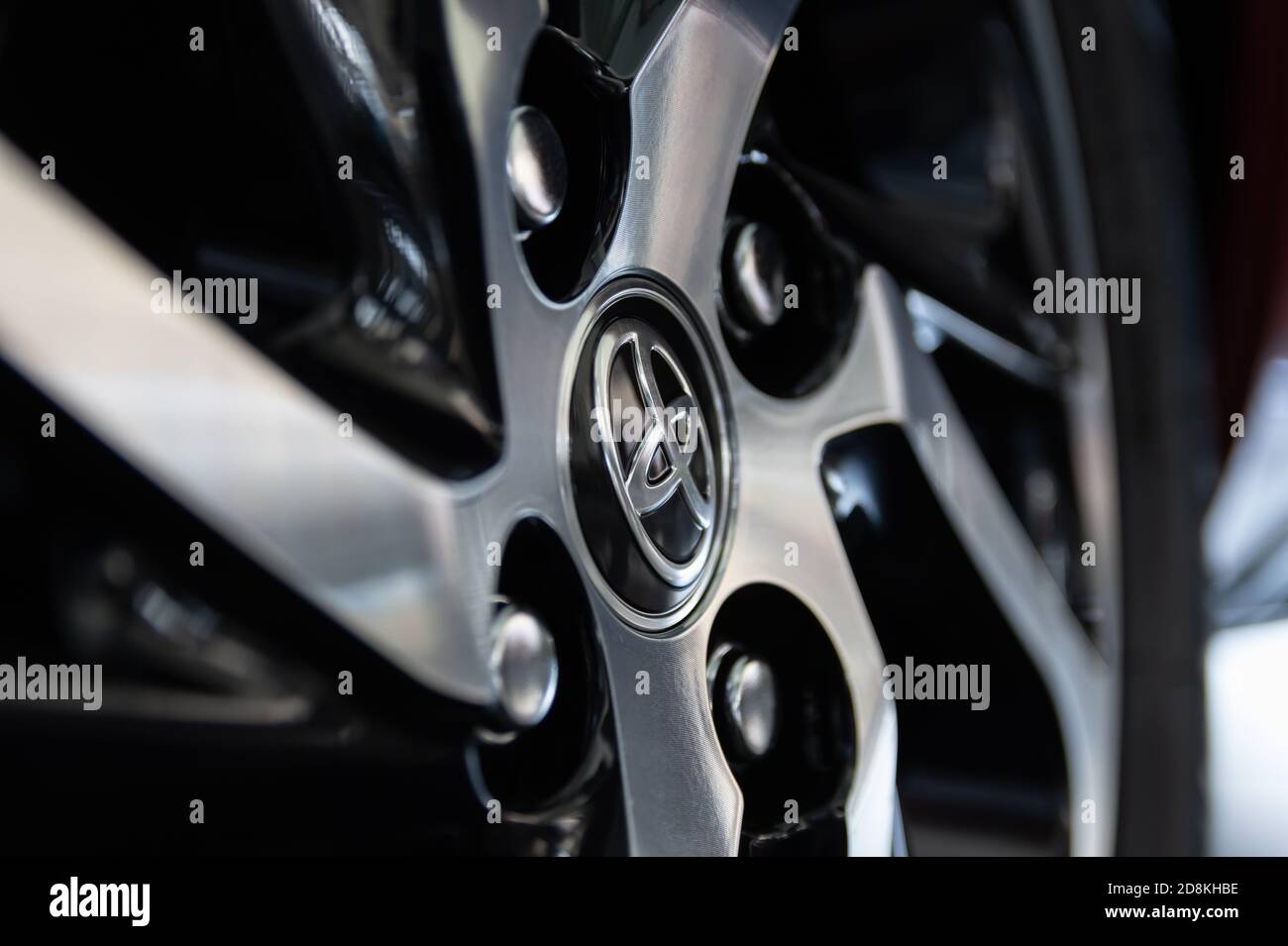 Phayao, Thailand - Sep 13, 2020: Magnesium Wheel Rim and Nut and Badge of Toyota Yaris Ativ 2020 Car Stock Photo