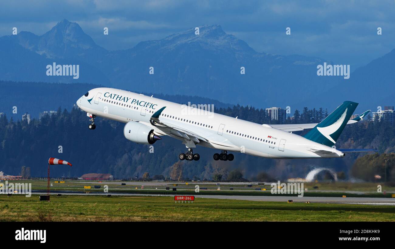 Richmond, British Columbia, Canada. 30th Oct, 2020. A Cathay Pacific Airways Airbus A350-900 jet (B-LQF) takes off from Vancouver International Airport on a flight from Vancouver to Hong Kong. Credit: Bayne Stanley/ZUMA Wire/Alamy Live News Stock Photo