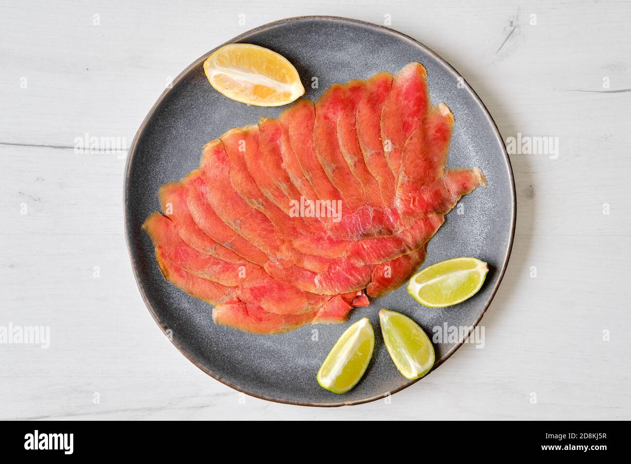 https://c8.alamy.com/comp/2D8KJ5R/top-view-of-smoked-thin-slices-of-salmon-fillet-2D8KJ5R.jpg