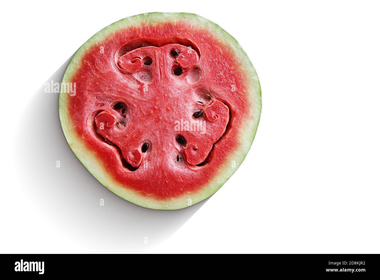 Close-up of a bright red watermelon with a sandy texture and an unusual pattern. Cut in half on a white background Stock Photo