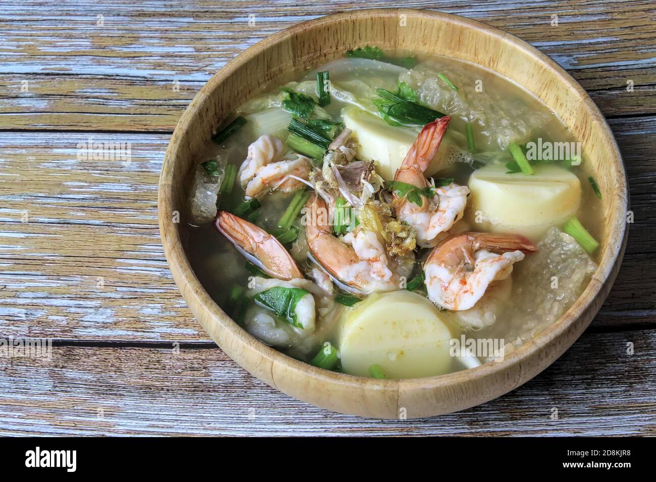 Tube tofu with shrimp and vegetables are the foods that Thai people tend to eat often put in wooden cups. Stock Photo