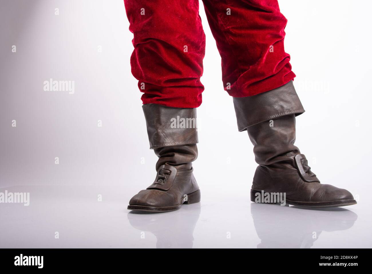 santa´s shoes or boots in white background Stock Photo - Alamy