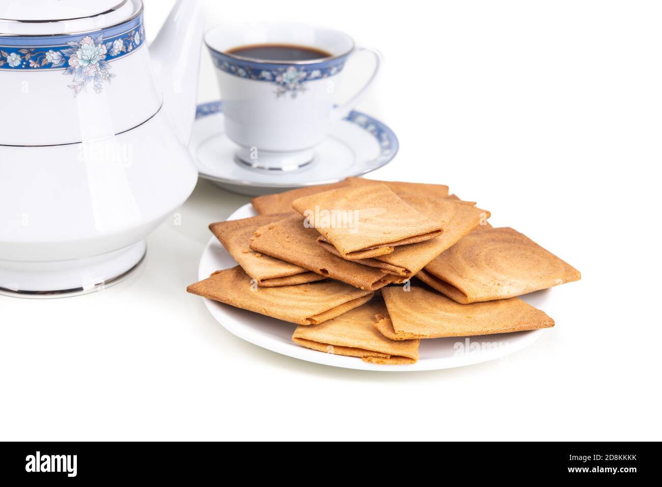 Kueh kapit with peanut and butter, with coffee Stock Photo