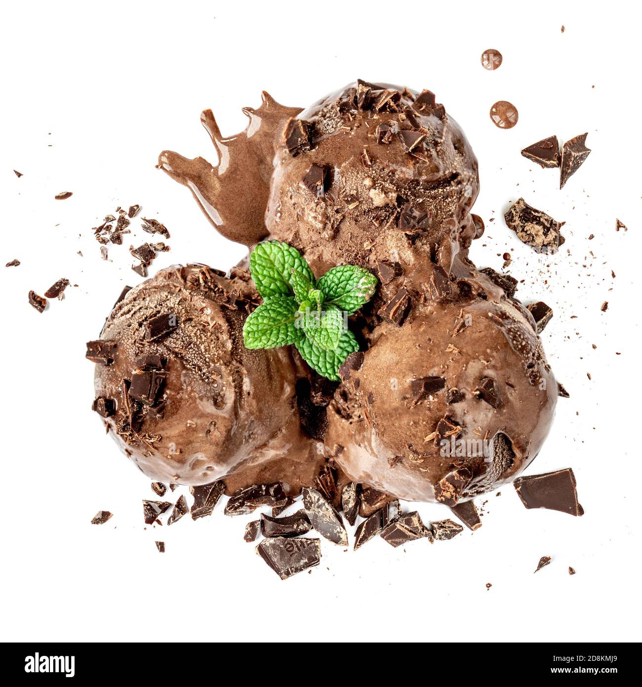 Chocolate ice cream balls with chocolate sauce isolated on white