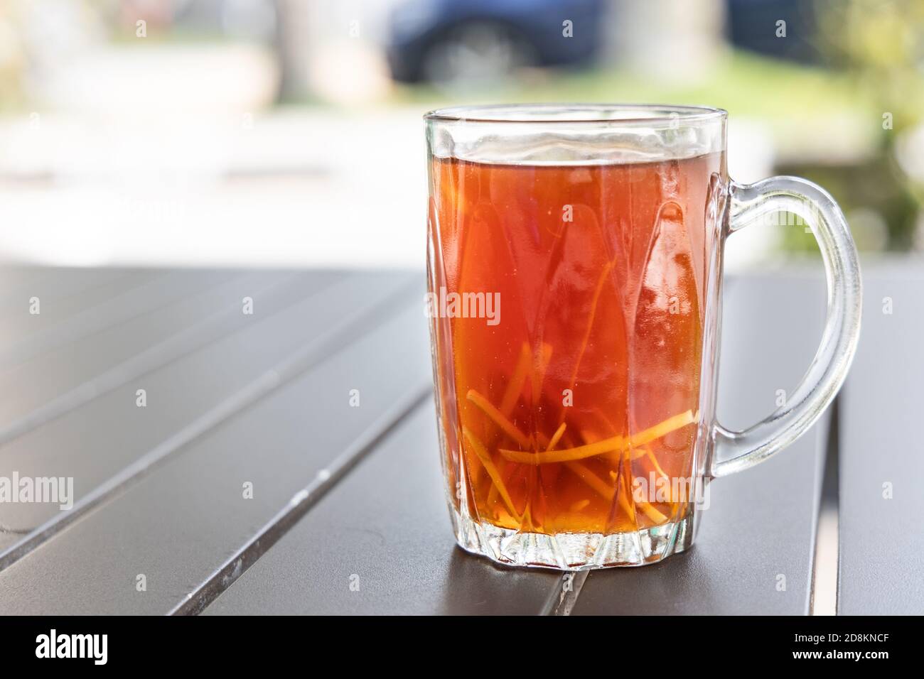 Black tea with ginger slice or known as Teh O Halia Stock Photo Alamy