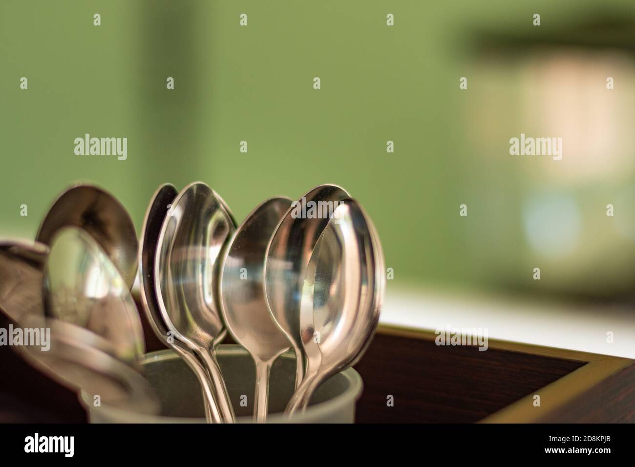 Stainless spoons in the glass use for stirring coffee Stock Photo Alamy