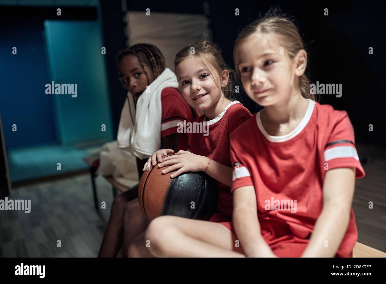 Kids at the locker room posing for a photo before training. Children team sport Stock Photo