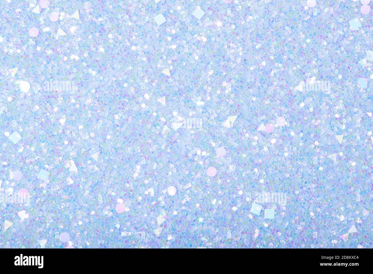 Holographic bright light blue glitter real texture background Stock Photo -  Alamy