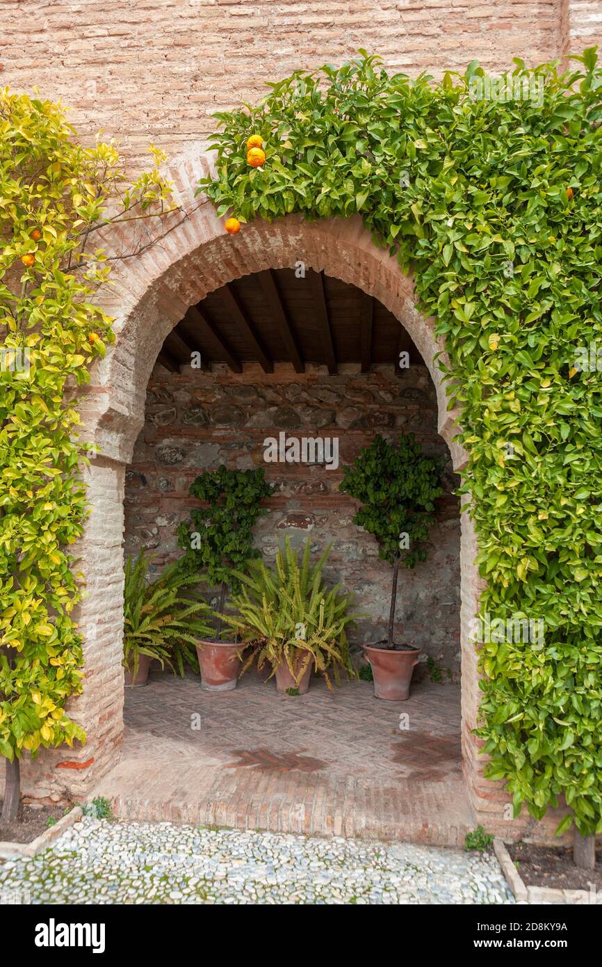 Arched doorway in the Casa de los Amigos - a guesthouse for the Sultan's friends - part of the Generalife Palace, La Alhambra, Granada, Andalusia, Spain Stock Photo
