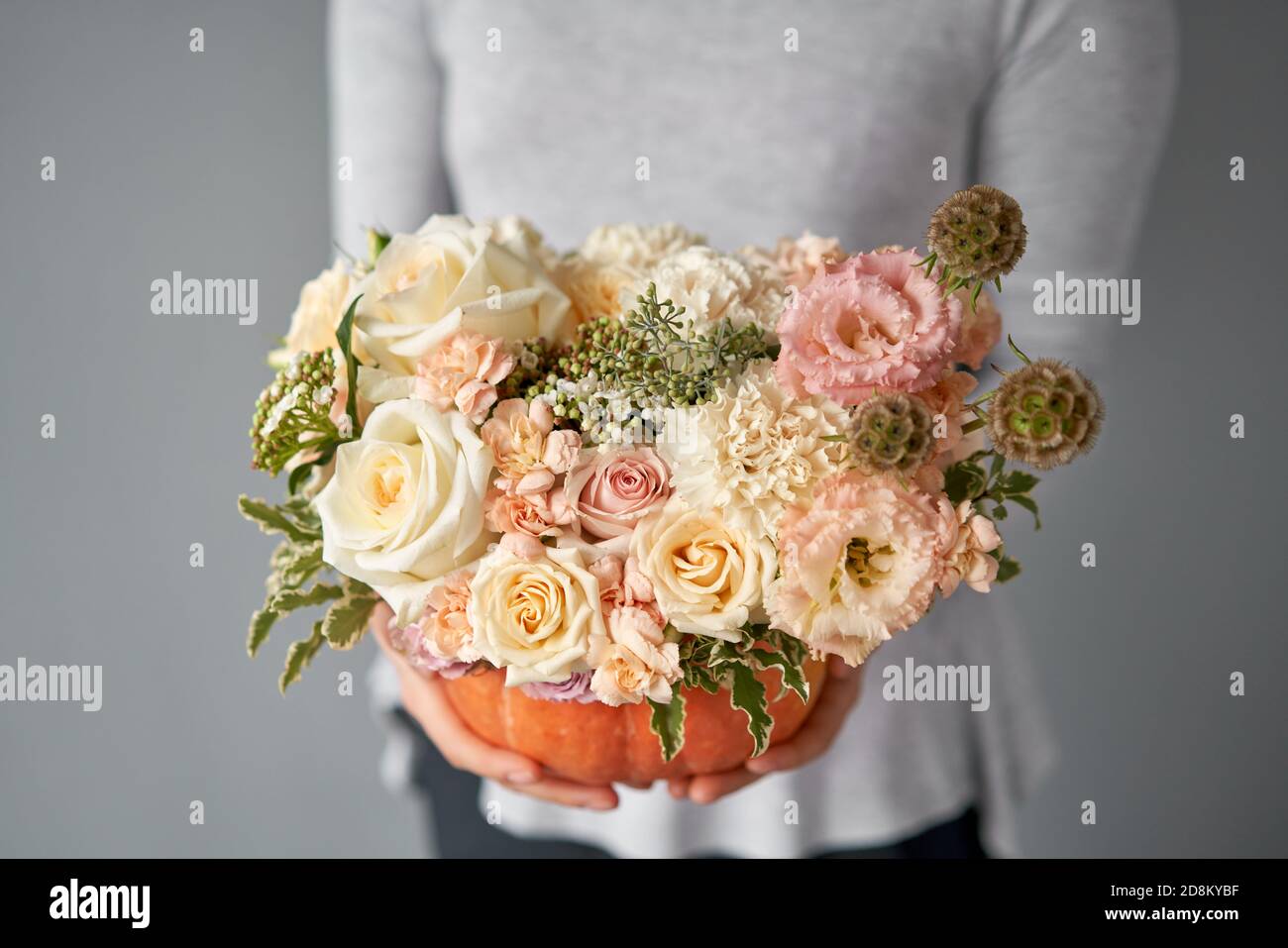 Flowers Arrangement In Pumpkin On The White Table Fresh Cut Flowers For Decoration Home European Floral Shop Delivery Fresh Cut Flower Stock Photo Alamy