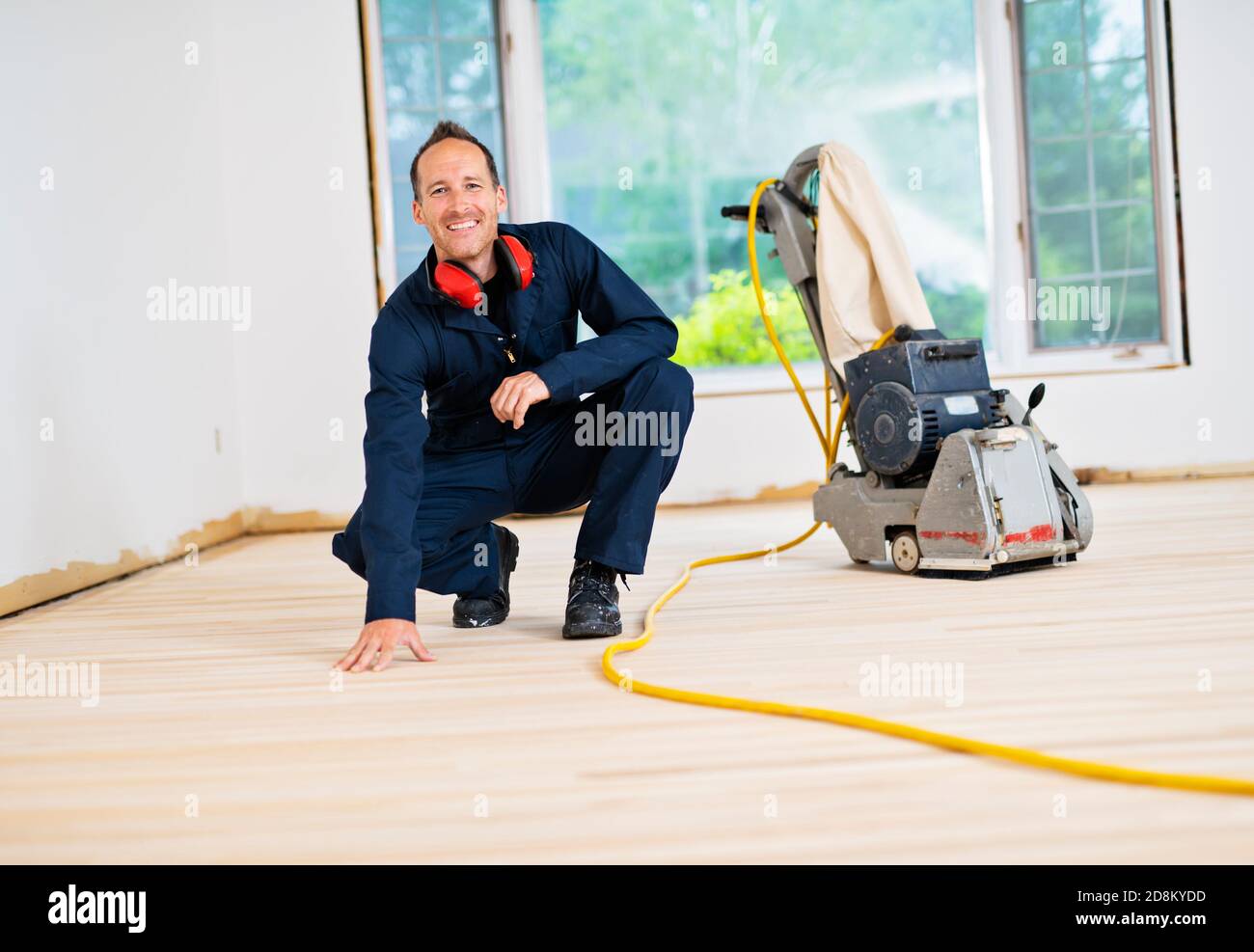 A Sanding hardwood floor with the grinding machine Stock Photo Alamy