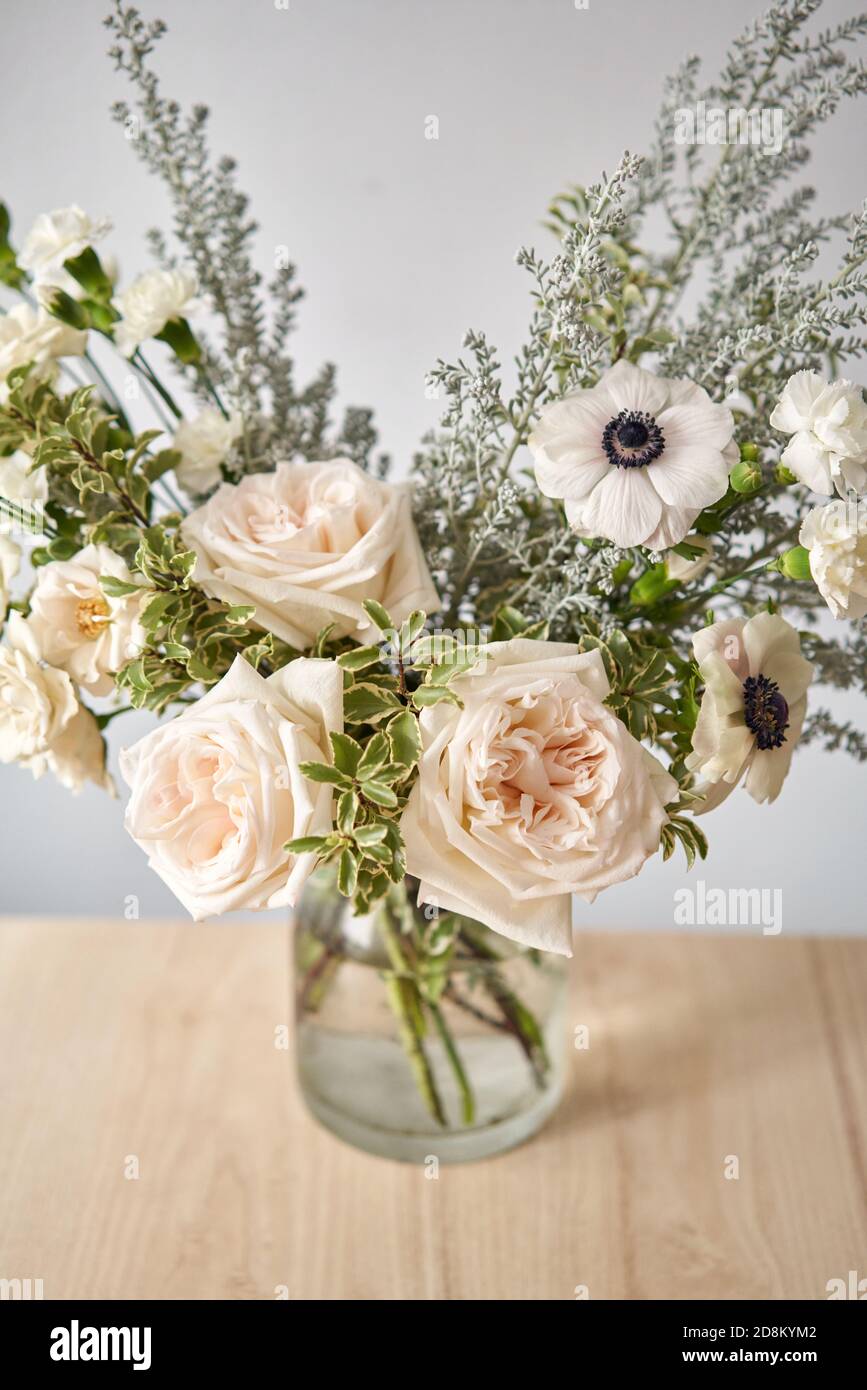 Bouquet 008, step by step installation of flowers in a vase. Flowers bunch, set for home. Fresh cut flowers for decoration home. European floral shop Stock Photo
