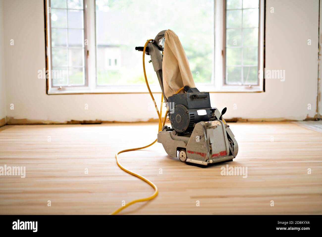 Sanding hardwood floor with the grinding machine only tool Stock Photo