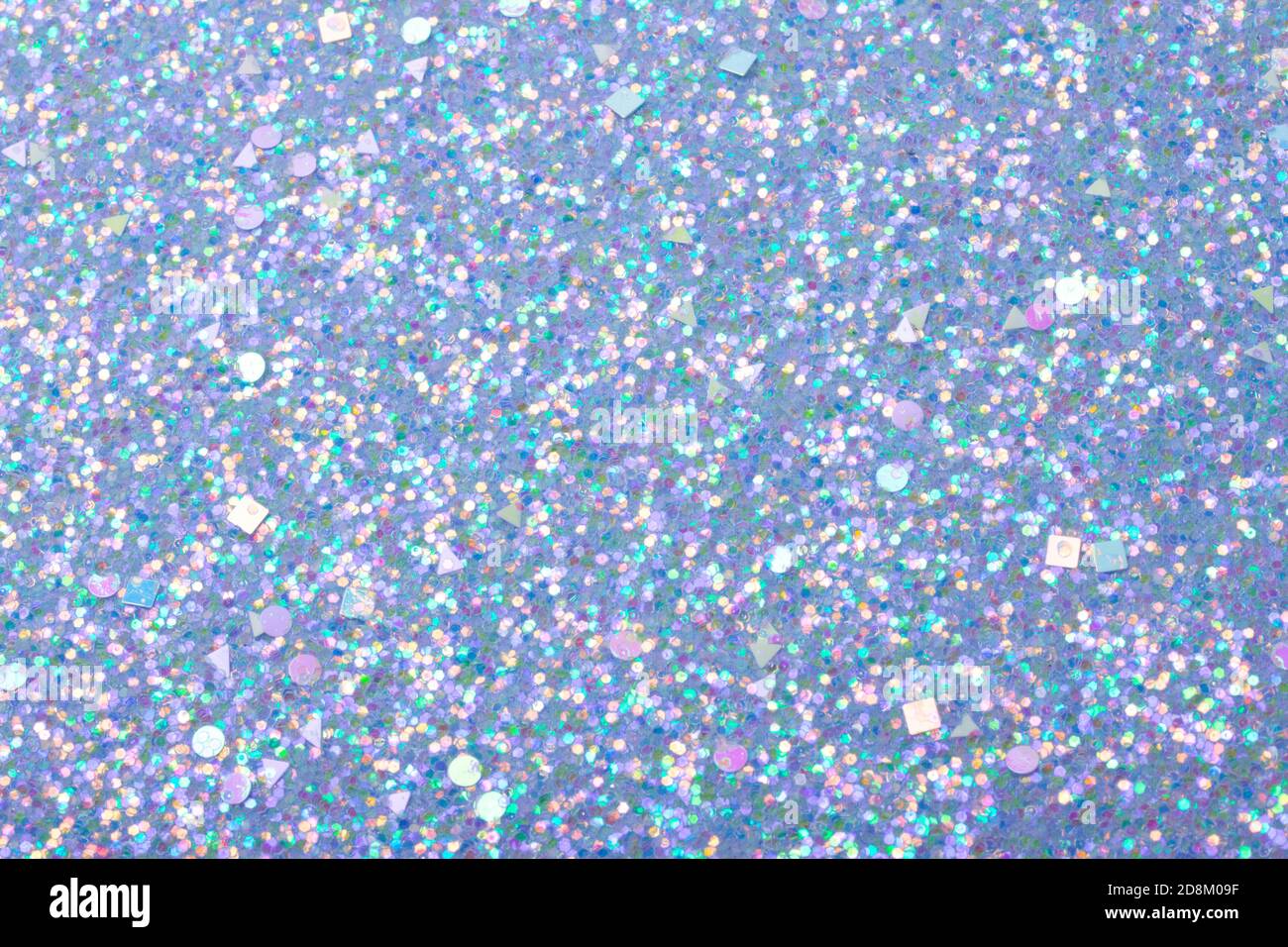 Holographic bright light blue glitter real texture background Stock Photo -  Alamy