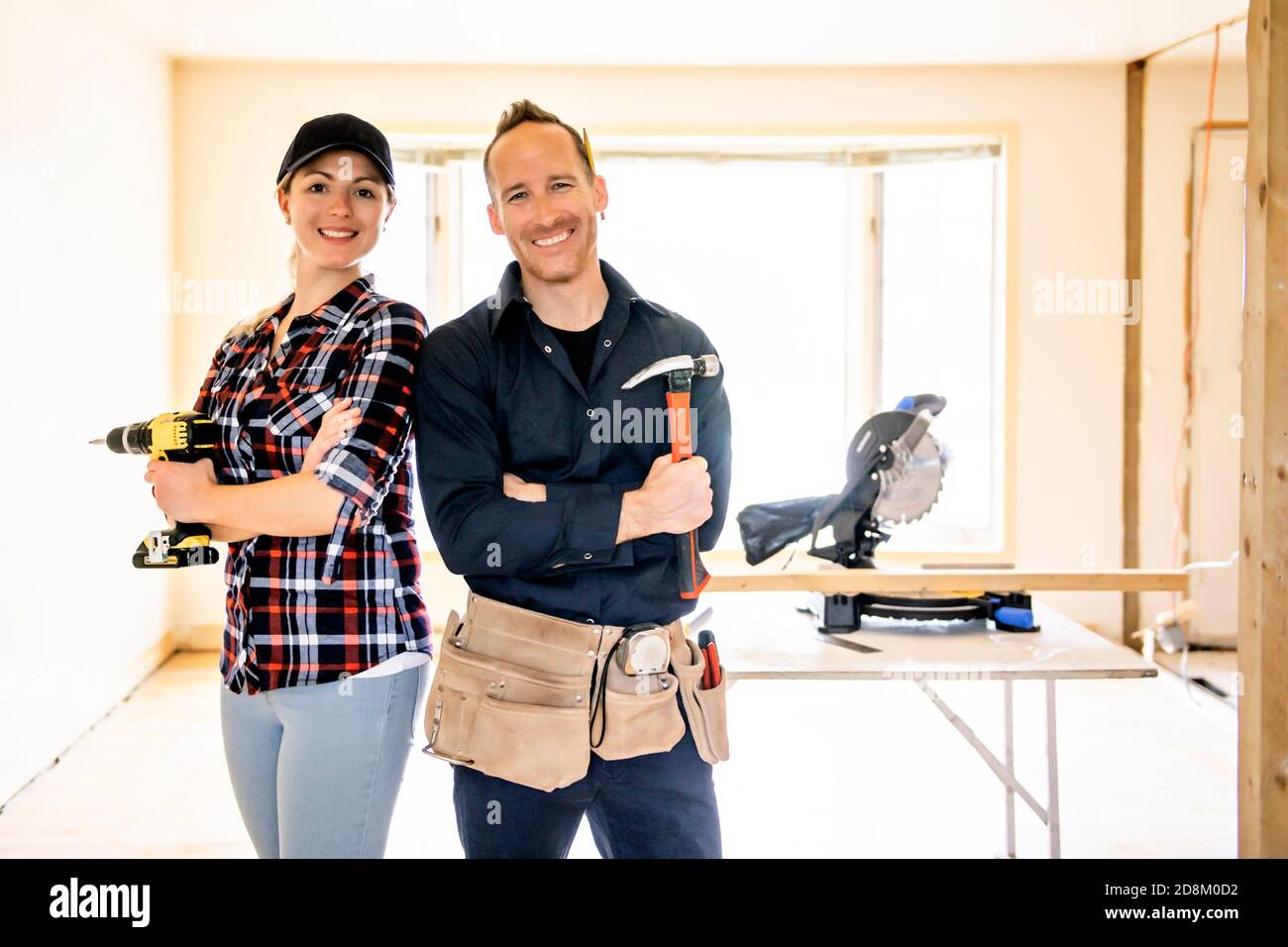 A couple worker in the carpenter workroom renovation Stock Photo