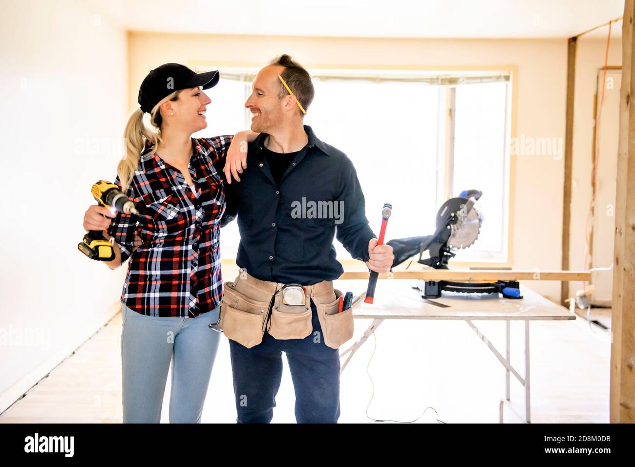 A couple worker in the carpenter workroom renovation Stock Photo