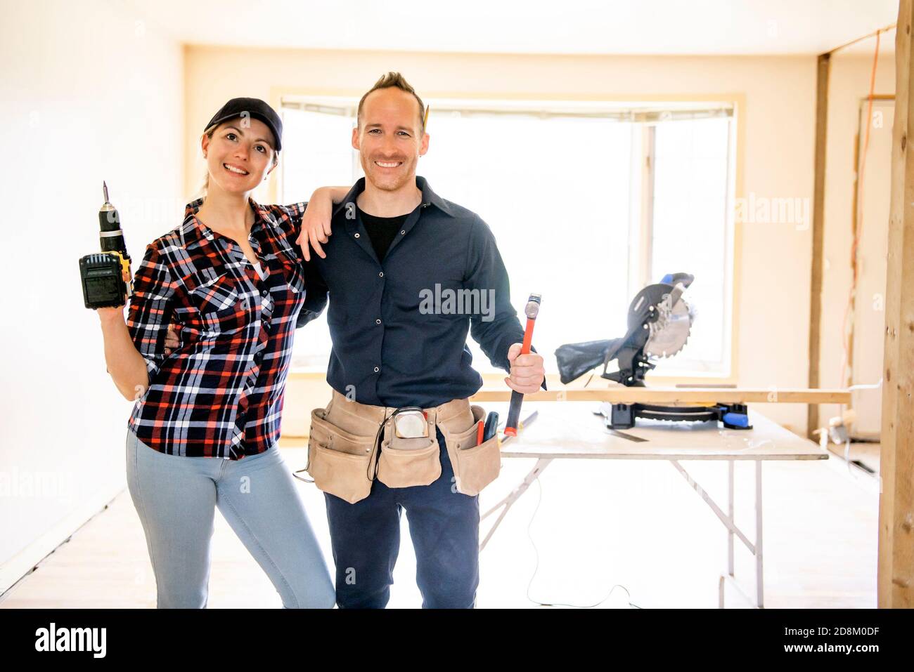 A couple worker in the carpenter workroom renovation Stock Photo