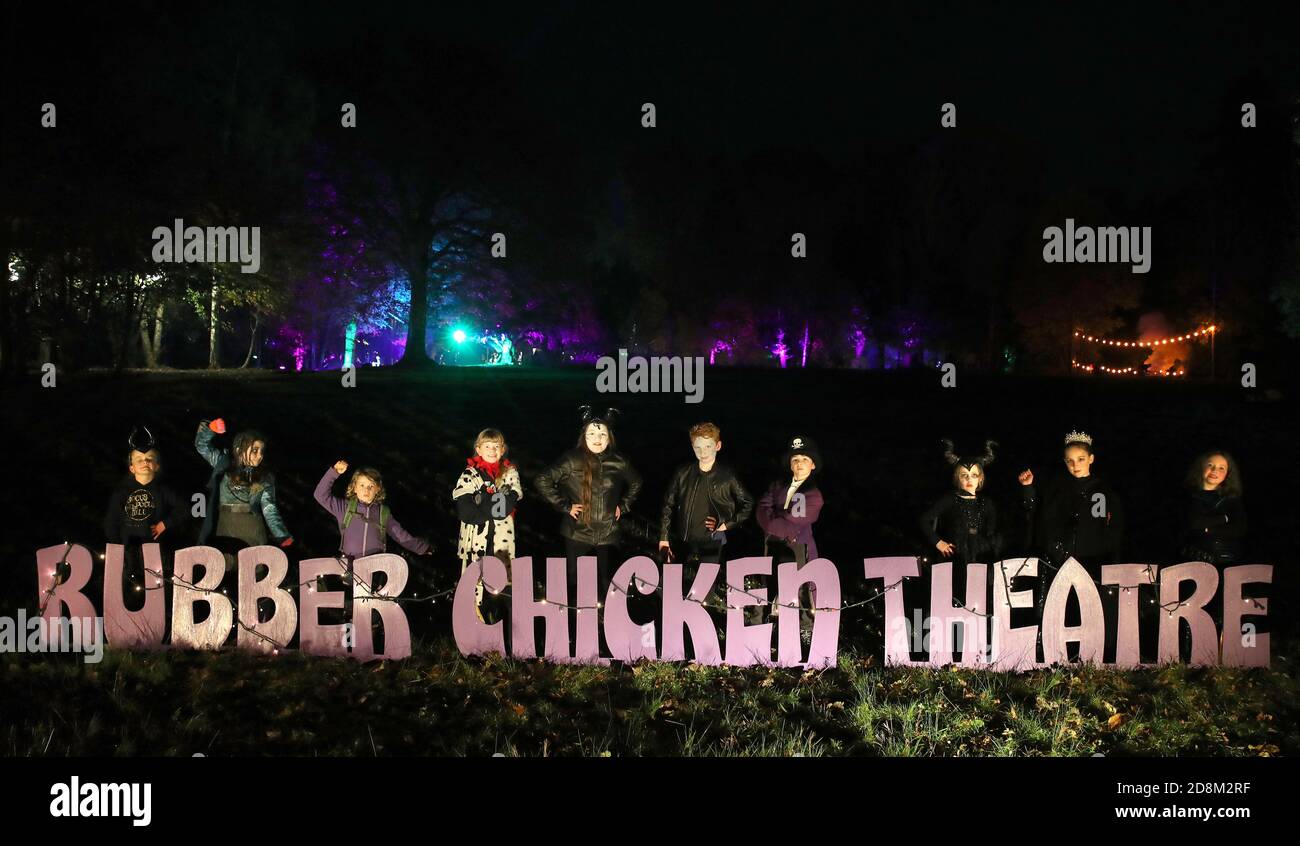 Members of Rubber Chicken Theatre at Hocus Pocus on the Hill an outdoor illuminated trail around Holmehill in Dunblane, featuring lights,music,dance and high flying aerial in amongst the trees. Stock Photo