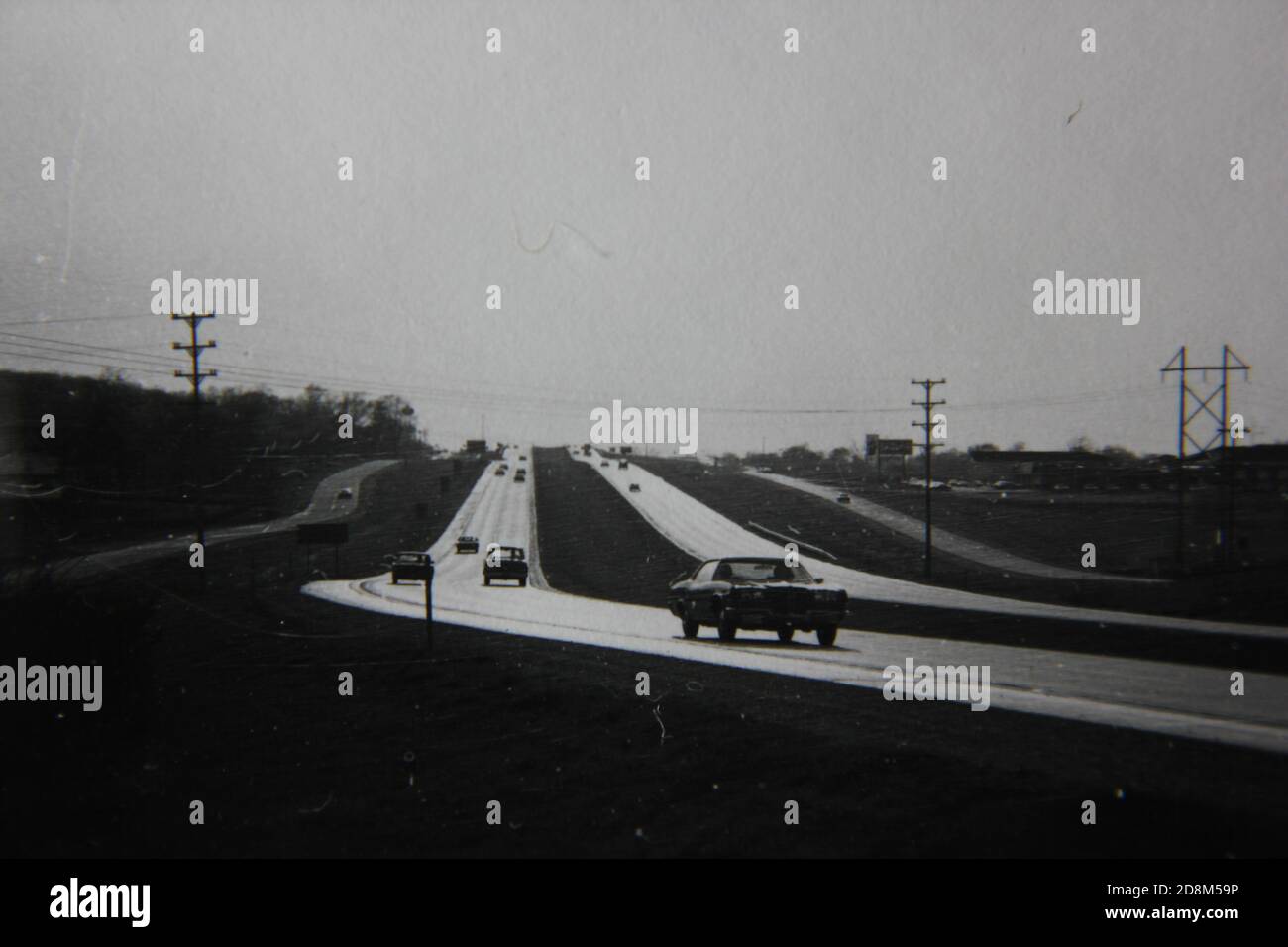 Fine 1970s vintage black and white photography on the road on a cross country drive on the interstate highway. Stock Photo
