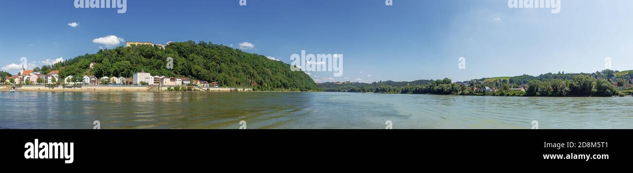 The confluence of the Danube, the Inn and the Ilz seen from the eastern tip of the historic city of Passau Stock Photo