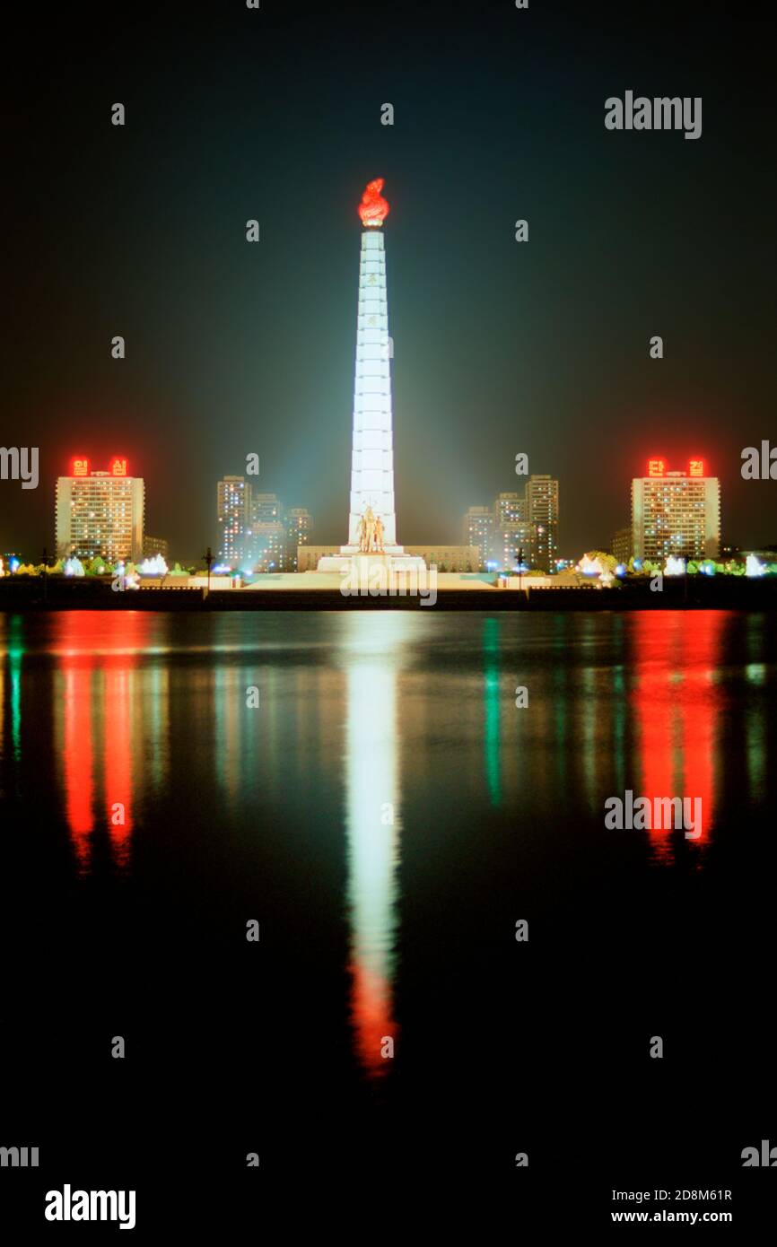 The Tower of the Juche Idea at night, Pyongyang Stock Photo