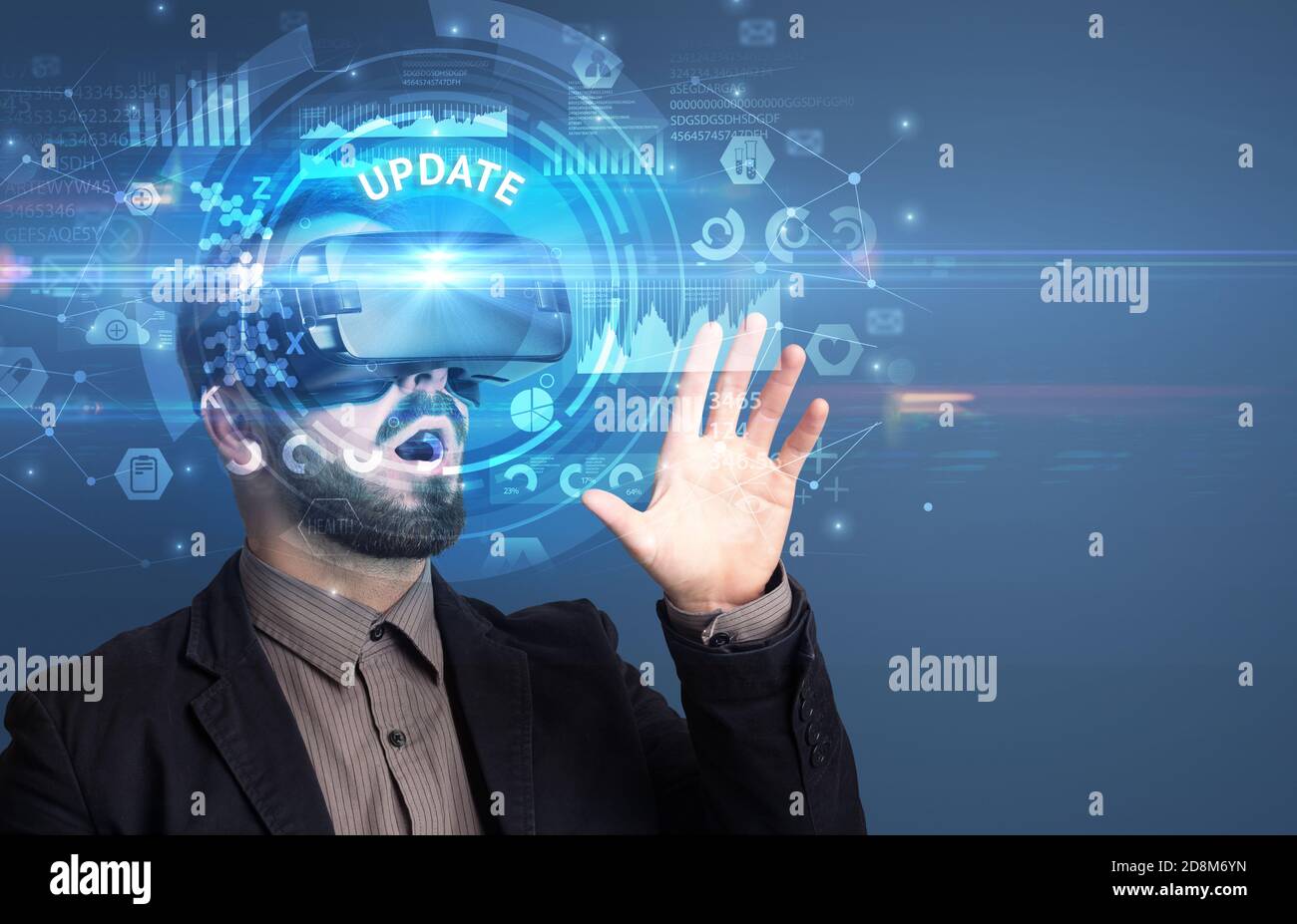 Businessman looking through Virtual Reality glasses with UPDATE ...