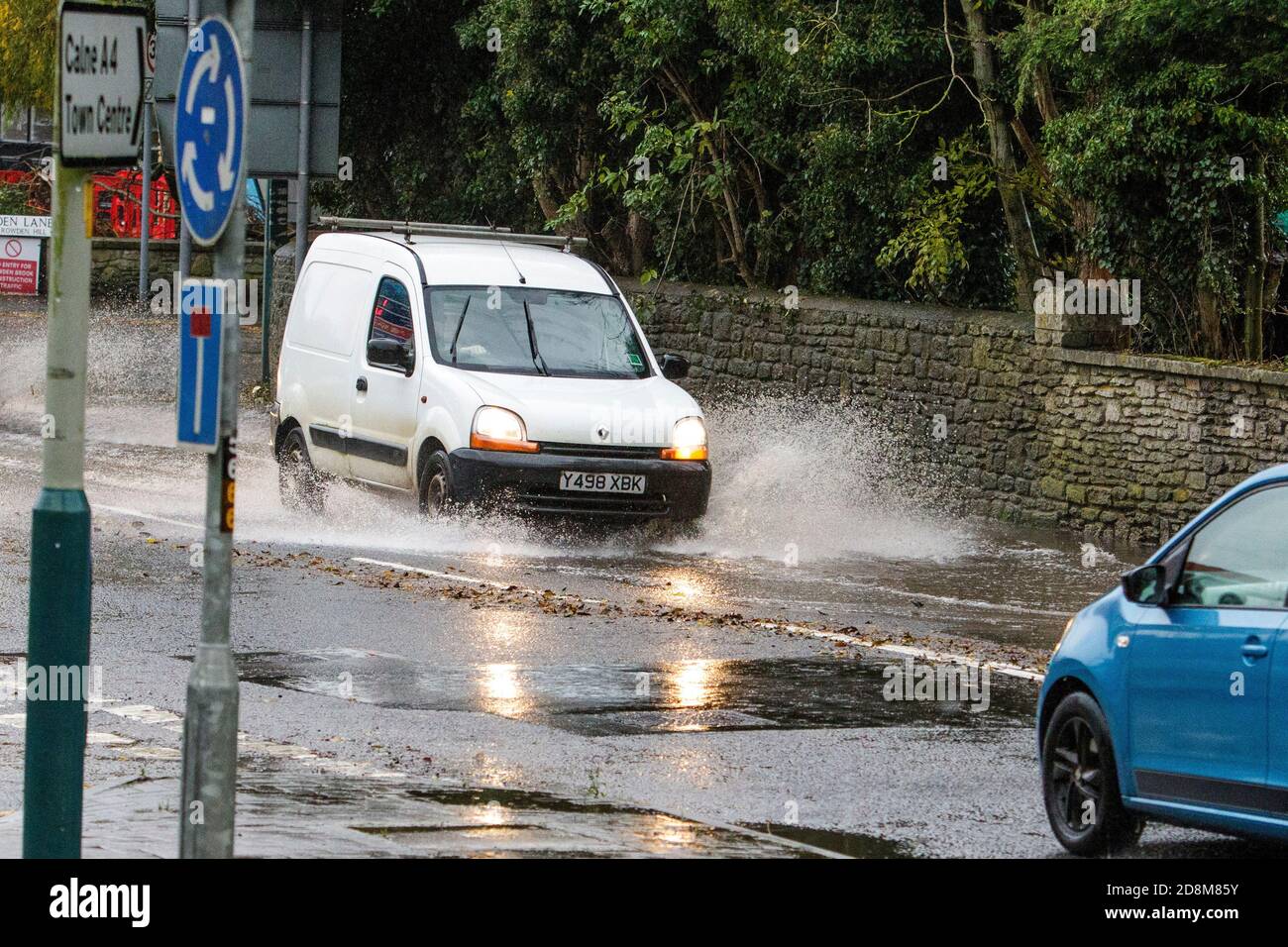 Chippenham, Wiltshire, UK. 31st October, 2020. As heavy showers affect many parts of the UK, drivers are pictured braving very heavy rain in Chippenham, Wiltshire. Credit: Lynchpics/Alamy Live News Stock Photo