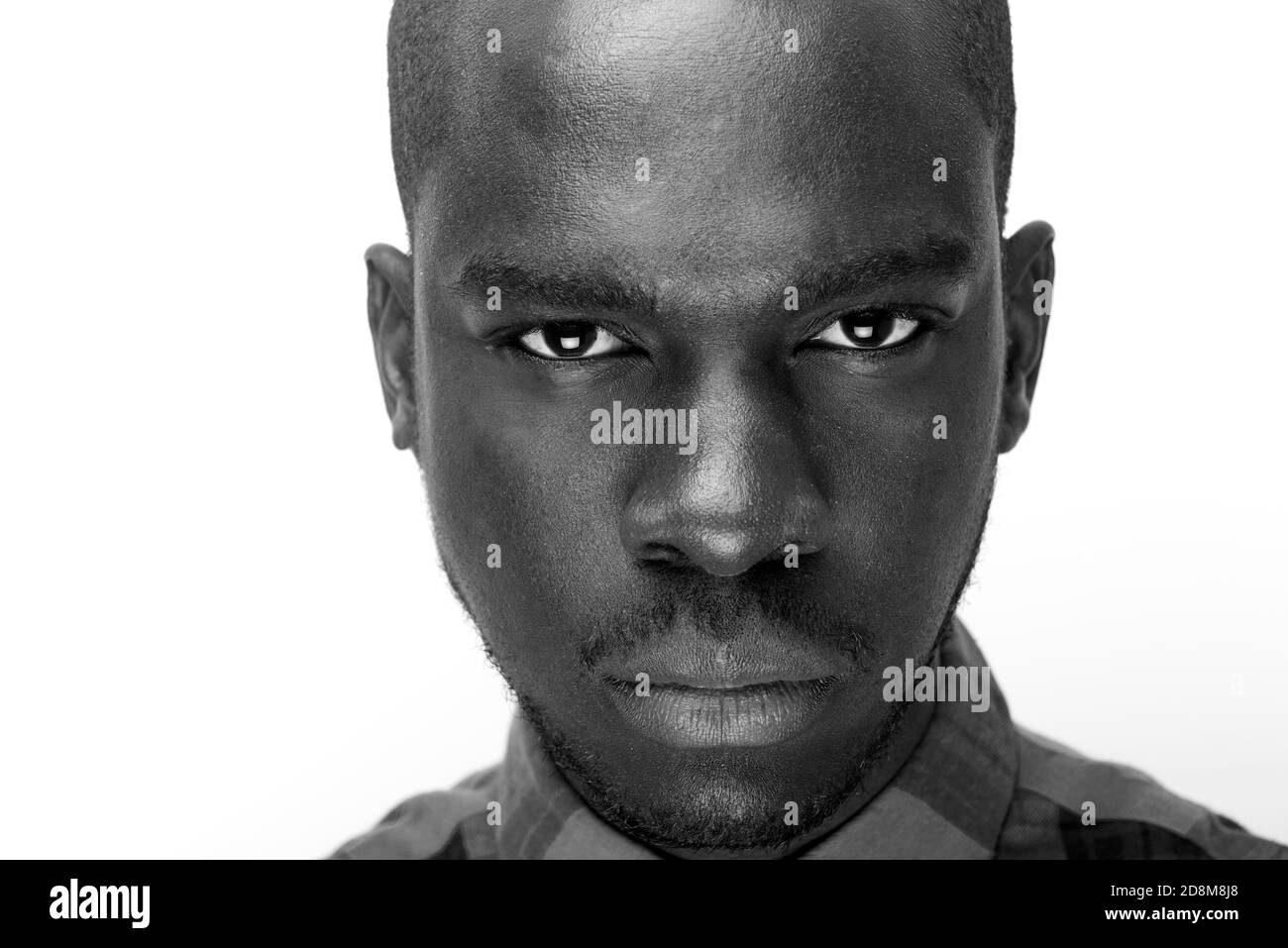 Close up black and white portrait of young black man staring Stock ...