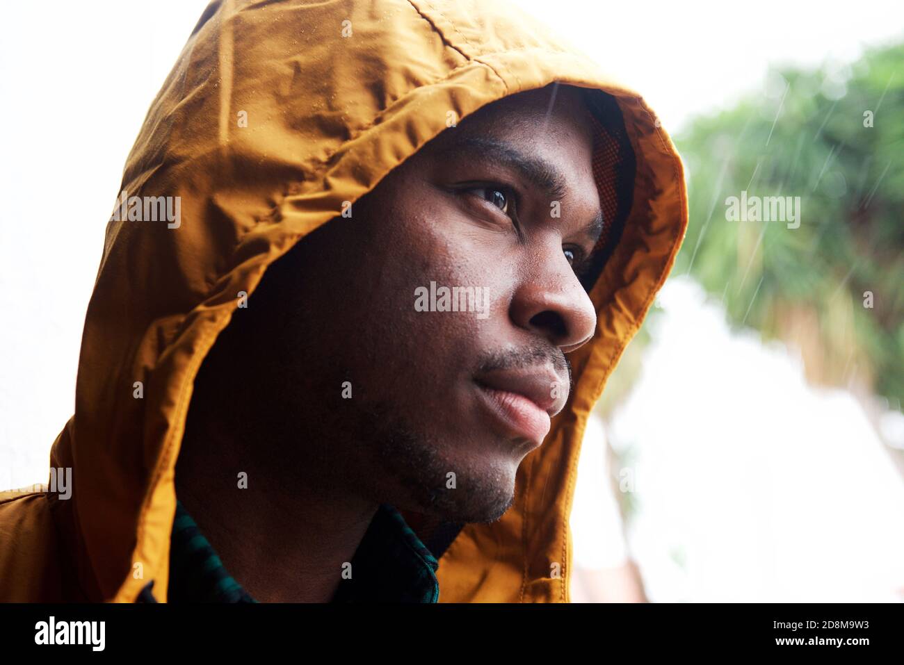 Contemplative african young man hi-res stock photography and images - Alamy