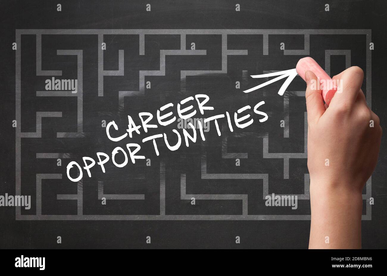 Hand drawing CAREER OPPORTUNITIES inscription with white chalk on