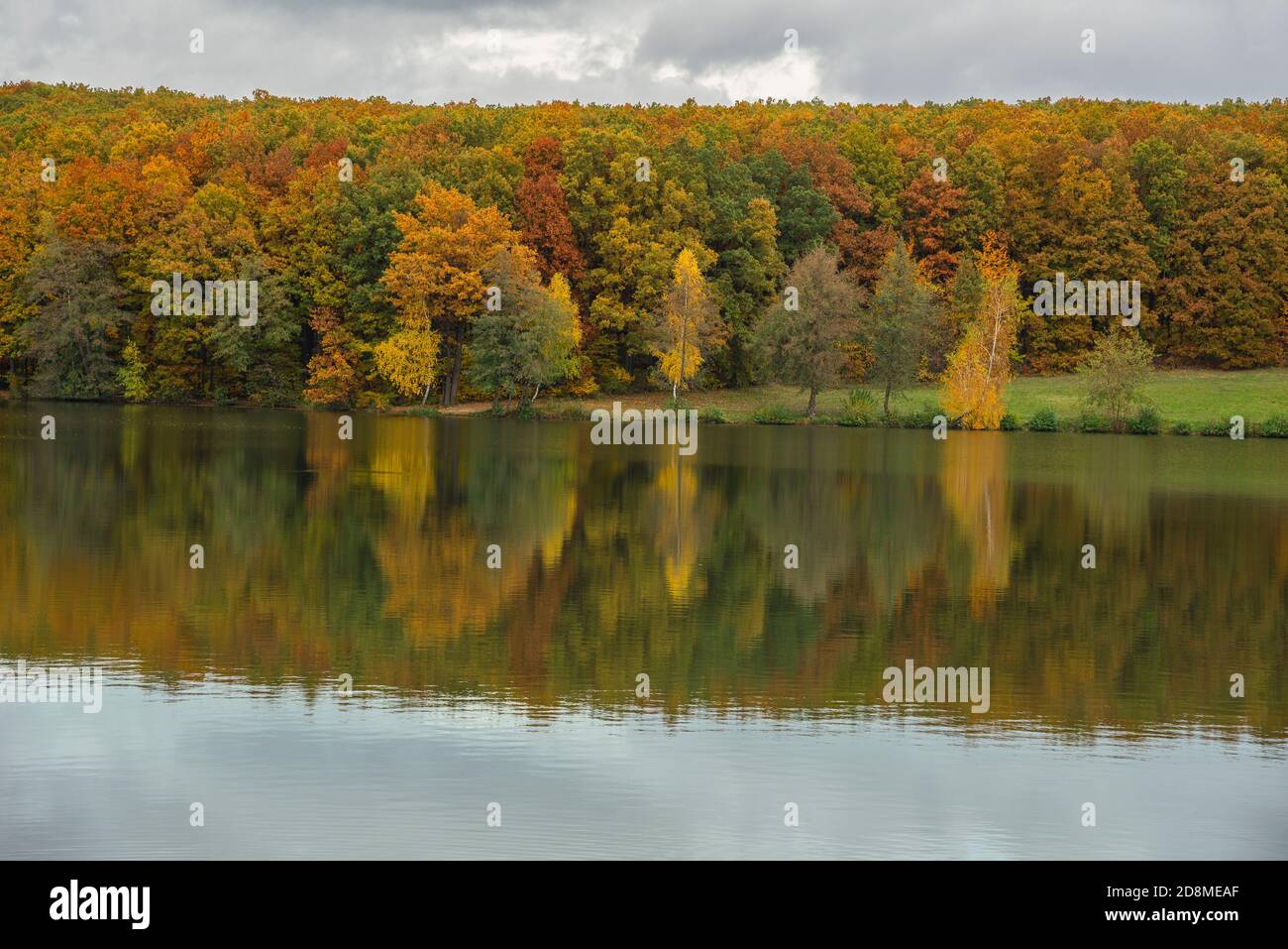 Autumn landscape with colorful forest and a lake Stock Photo - Alamy