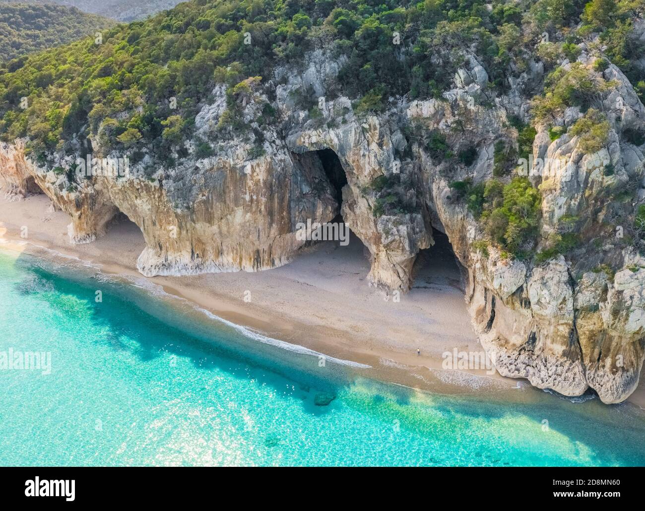 Aerial view of the amazing beach and caves of Cala Luna, Orosei gulf, Nuoro district, Ogliastra, Sardinia, Italy. Stock Photo