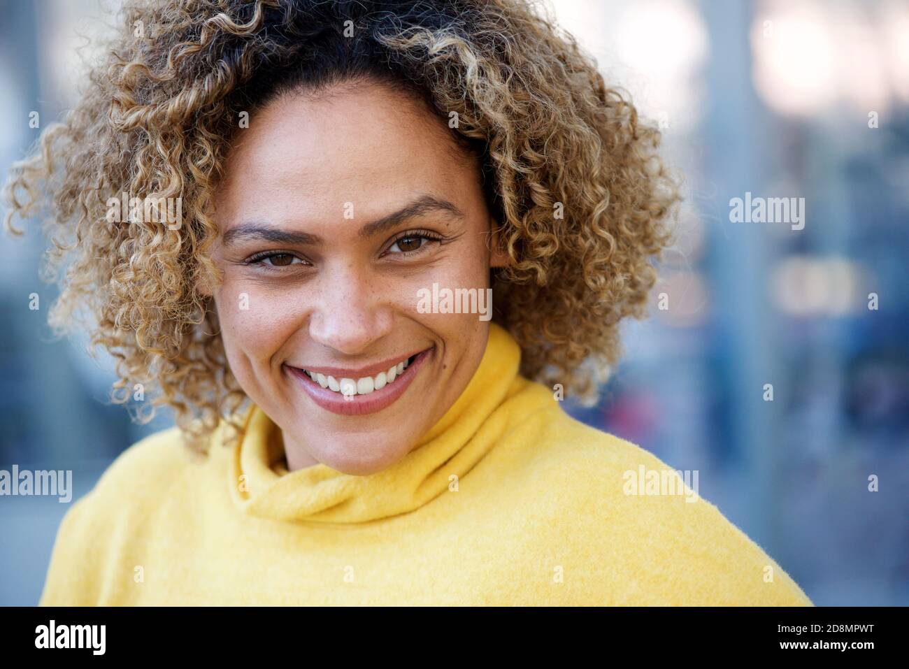 Close up portrait of happy african american woman with curly hair Stock ...