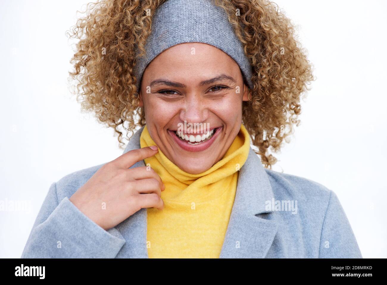 Close up portrait of beautiful african american woman laughing against ...