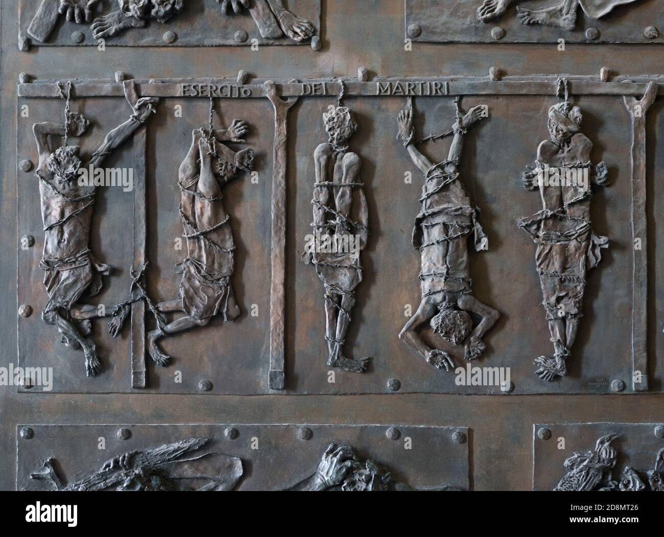 Door Detail of St Peters Basillica, the Vatican, Rome, Italy. The bronze sculpture depicts Christian Martyrs. Stock Photo