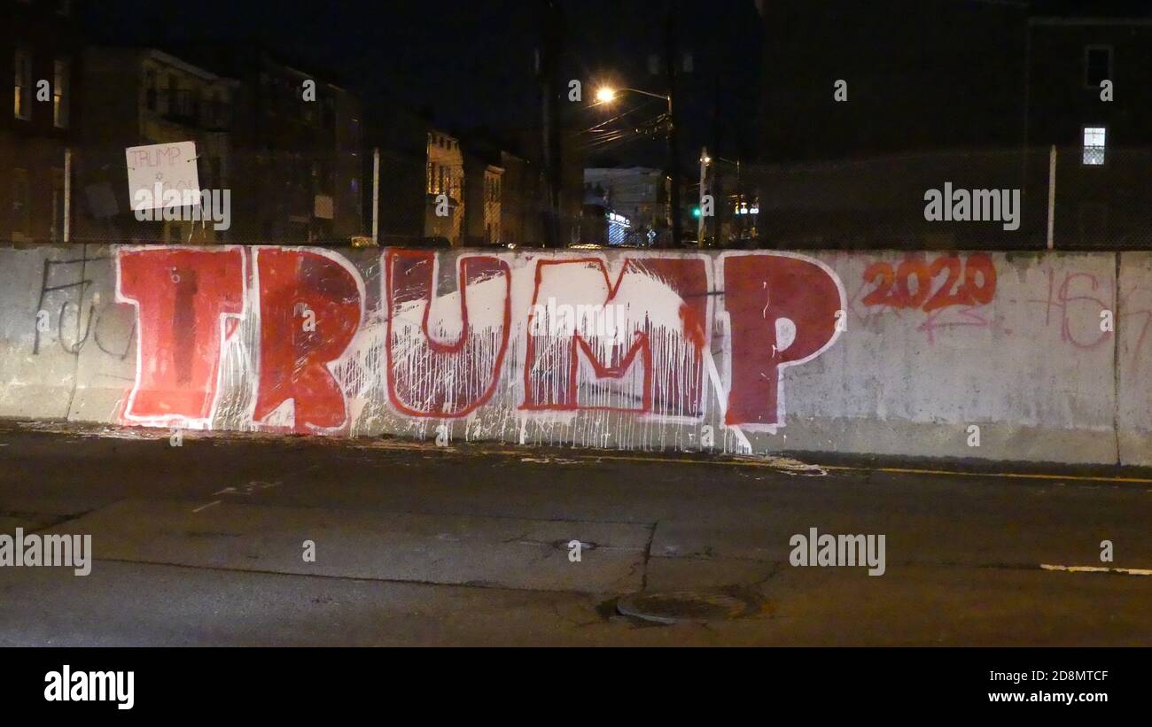 https://c8.alamy.com/comp/2D8MTCF/new-jersey-usa-31st-oct-2020-a-lone-urban-new-jersey-graffiti-artist-has-a-field-day-in-the-face-of-raging-electoral-conflict-oct-30-2020-paterson-nj-usa-in-a-traditionally-democratic-new-jersey-township-positioned-at-the-junction-of-urban-poverty-and-great-wealth-in-the-estates-beyond-the-surprising-work-of-an-anonymous-pro-trump-graffiti-artist-reflects-the-symbolic-impact-and-penetration-of-president-trumps-message-on-a-transforming-electoral-landscape-credit-julia-mineevathenews2-credit-julia-mineevathenews2zuma-wirealamy-live-news-2D8MTCF.jpg