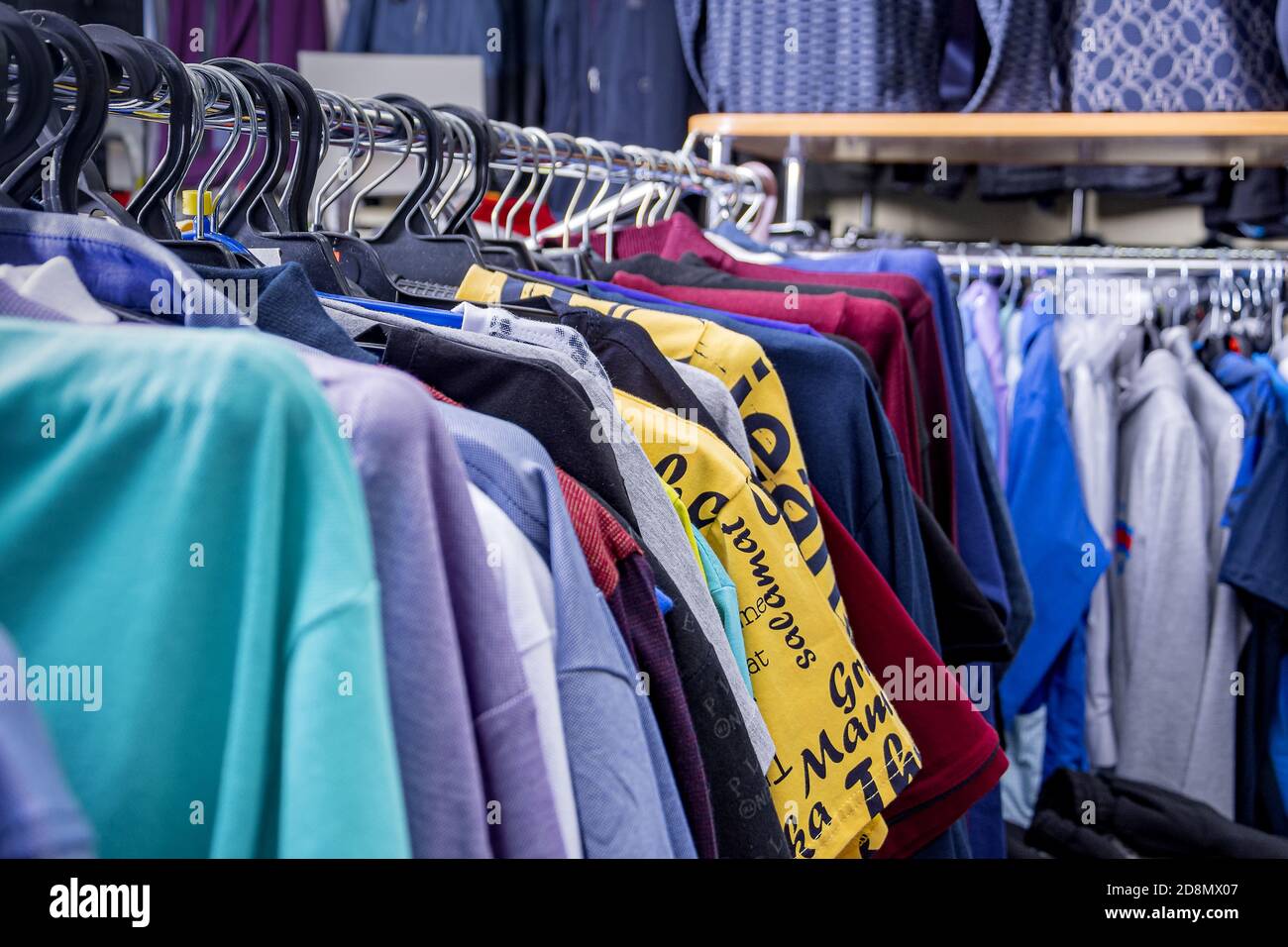 Fabric samples hanging on rack hi-res stock photography and images - Alamy