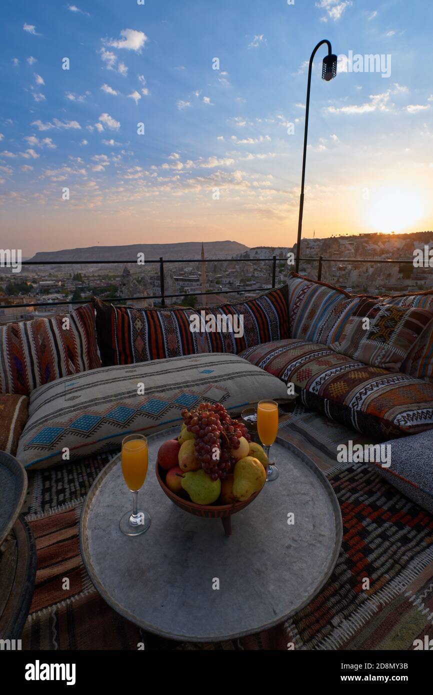 Photo spot in Cappadocia with turkish carpets, mats, cushions and fruit serving, Goreme Stock Photo