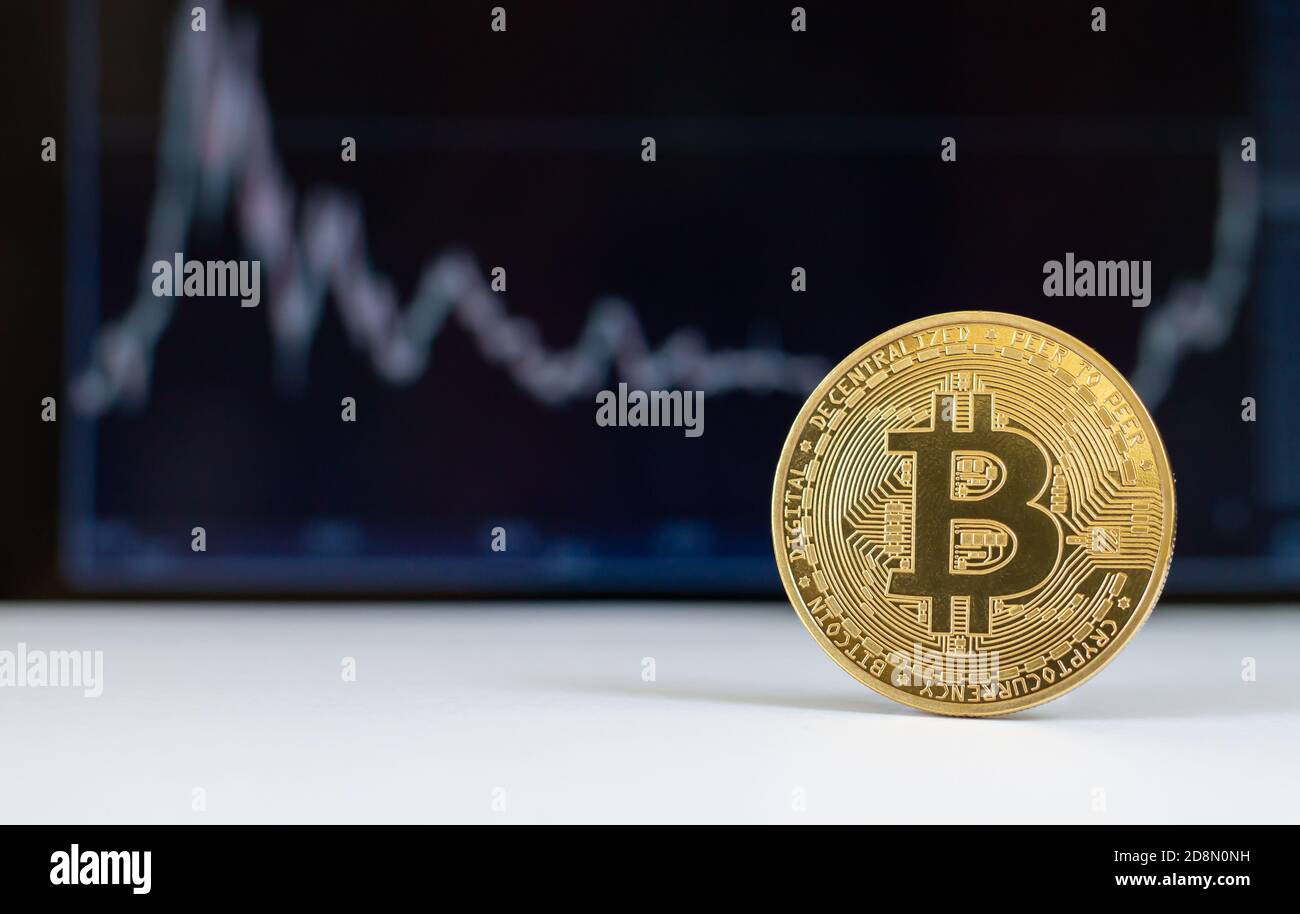 Bitcoin virtual cryptocurrency with growth chart Stock Photo