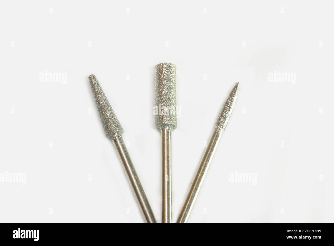 Set of three milling cutters for manicure creating Stock Photo