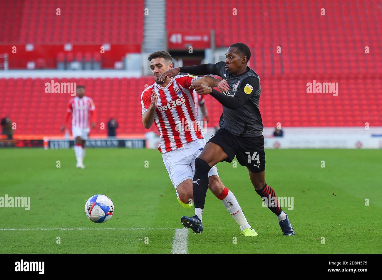 STOKE ON TRENT, ENGLAND. OCTOBER 31ST Mickel Miller of Rotherham United battles with Tommy Smith of Stoke City during the Sky Bet Championship match between Stoke City and Rotherham United at the Britannia Stadium, Stoke-on-Trent on Saturday 31st October 2020. (Credit: Jon Hobley | MI News) Credit: MI News & Sport /Alamy Live News Stock Photo