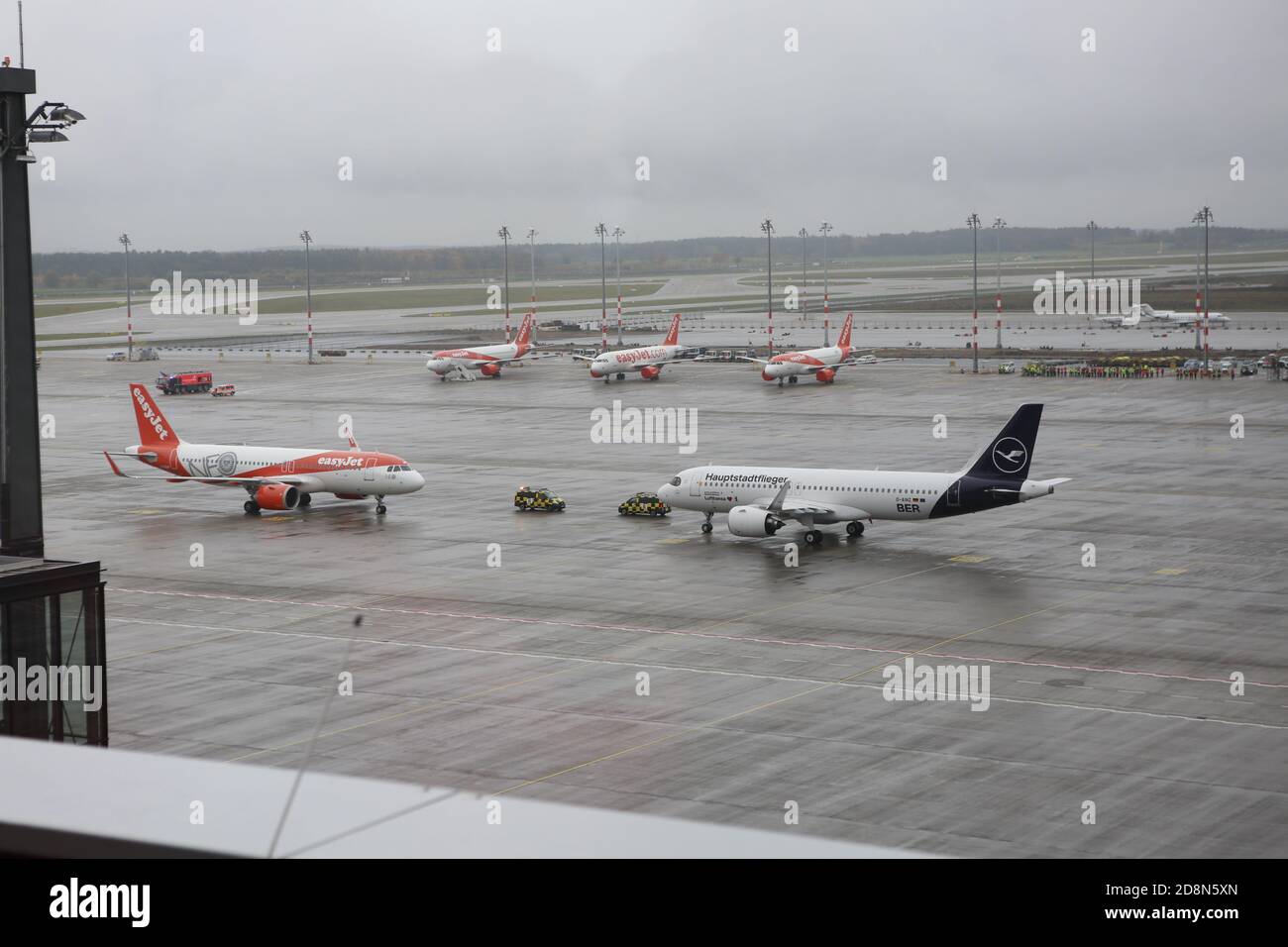 10/31/2020, Schönefeld, Germany, Arrival of the first easyJet and the first Lufthansa flight at the new Berlin Brandenburg Willy Brandt Airport in Schönefeld.. Arrival of the first two flights from easyJet and Lufthansa to the new Berlin Brandenburg Willy Brandt Airport in Schönefeld. on  October 31th. Stock Photo