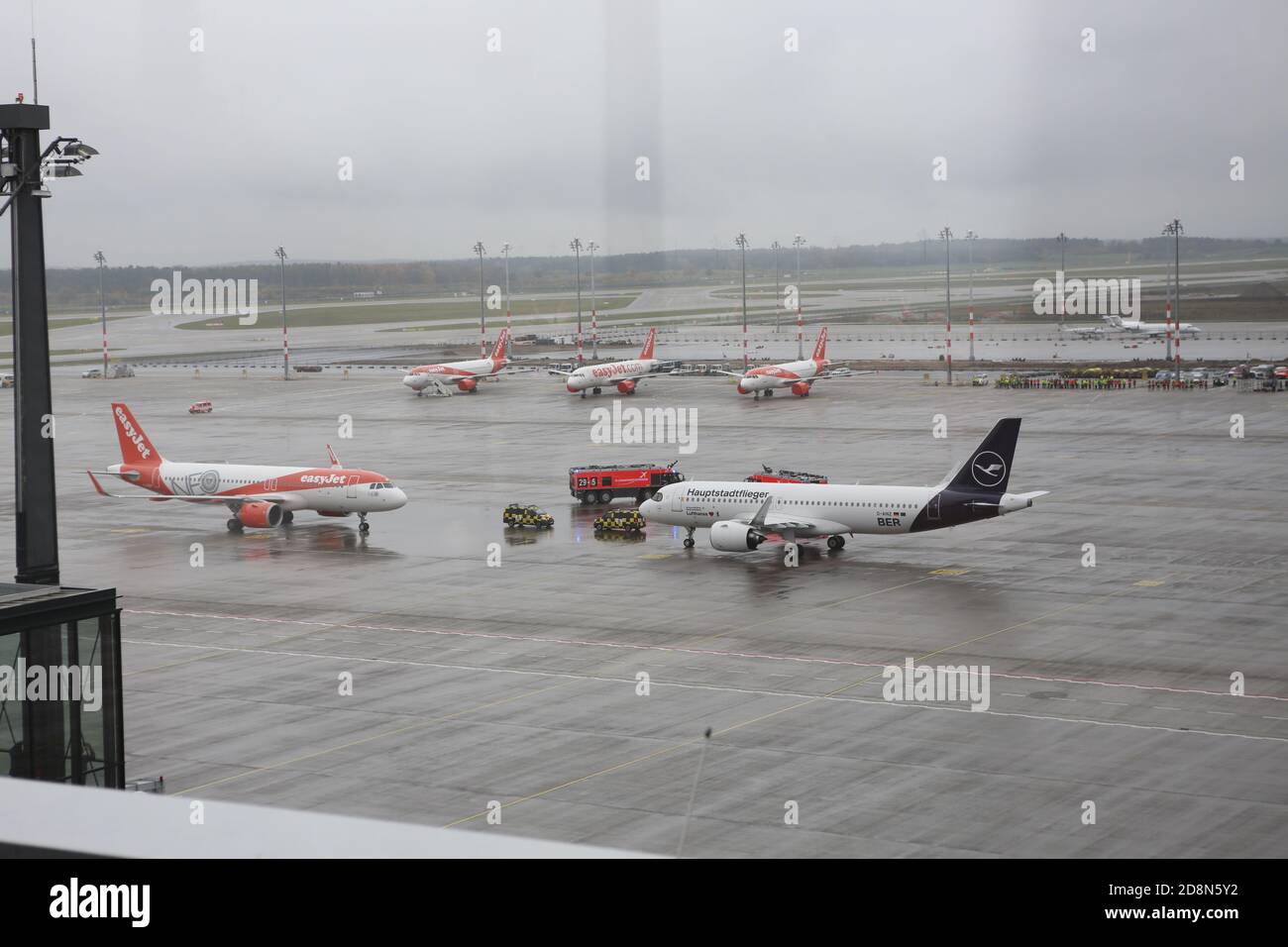 10/31/2020, Schönefeld, Germany, Arrival of the first easyJet and the first Lufthansa flight at the new Berlin Brandenburg Willy Brandt Airport in Schönefeld.. Arrival of the first two flights from easyJet and Lufthansa to the new Berlin Brandenburg Willy Brandt Airport in Schönefeld. on  October 31th. Stock Photo