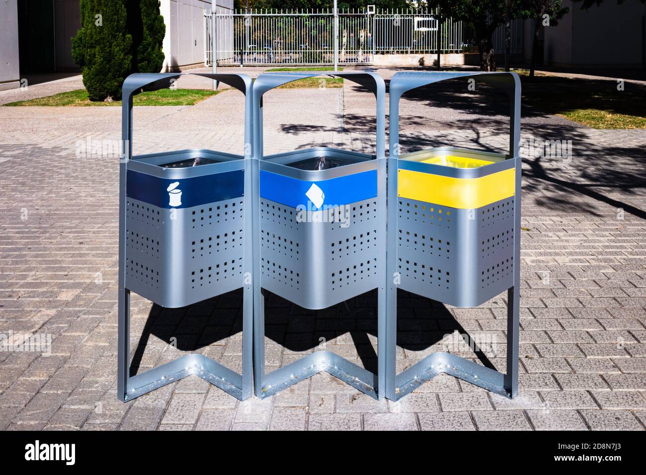 Metal waste separation bins on a public street Stock Photo Alamy