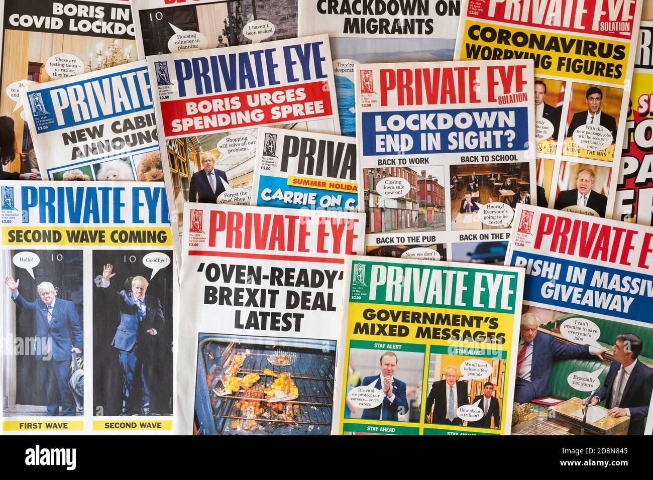 A collection of Private Eye news and current affairs magazine front covers showing recent UK headlines on Brexit and Covid-19 Stock Photo
