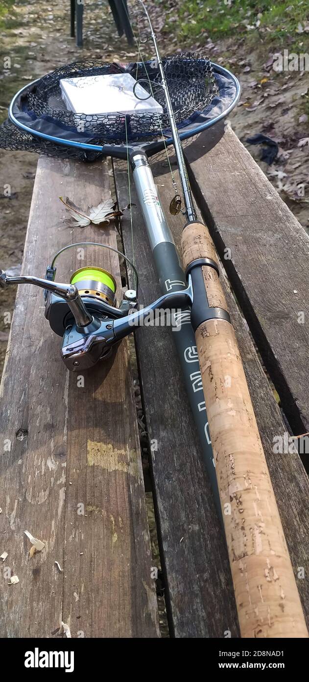 Trout fishing equipment in the lake with the spinning technique Stock Photo Alamy