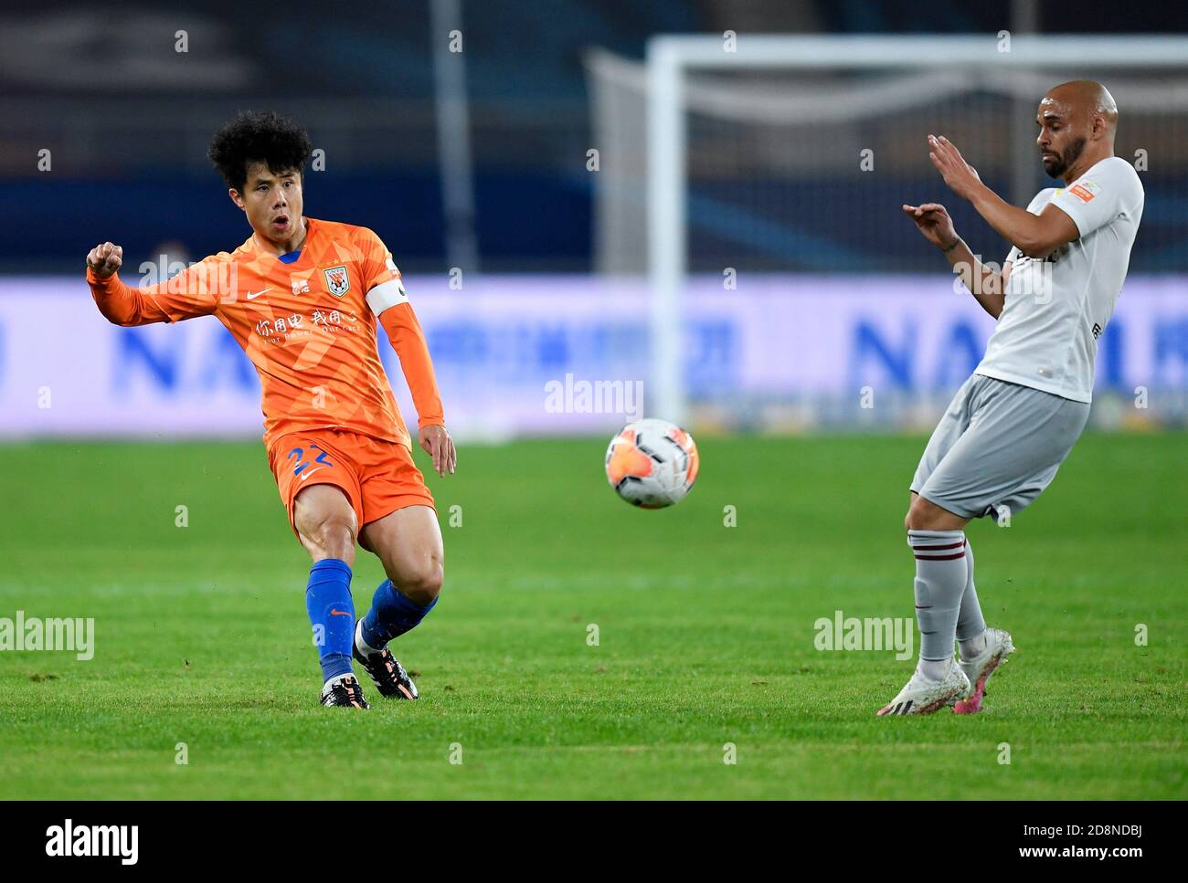 Suzhou China S Jiangsu Province 31st Oct Hao Junmin L Of Shandong Luneng Passes The Ball During The 18th Round Match Between Shandong Luneng And Hebei China Fortune At Season Chinese Suzhou China S Jiangsu Province 31st Oct Hao Junmin L Of Shandong Luneng Passes The Ball During The 18th Round Match Between Shandong Luneng And Hebei China Fortune At Season Chinese