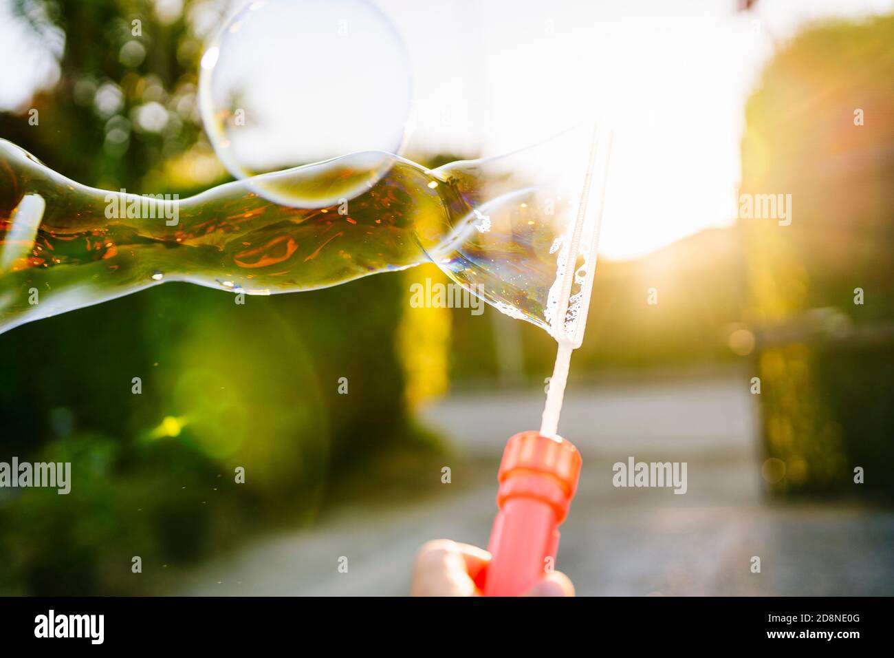 Soap Bubbles Game at sunset Stock Photo