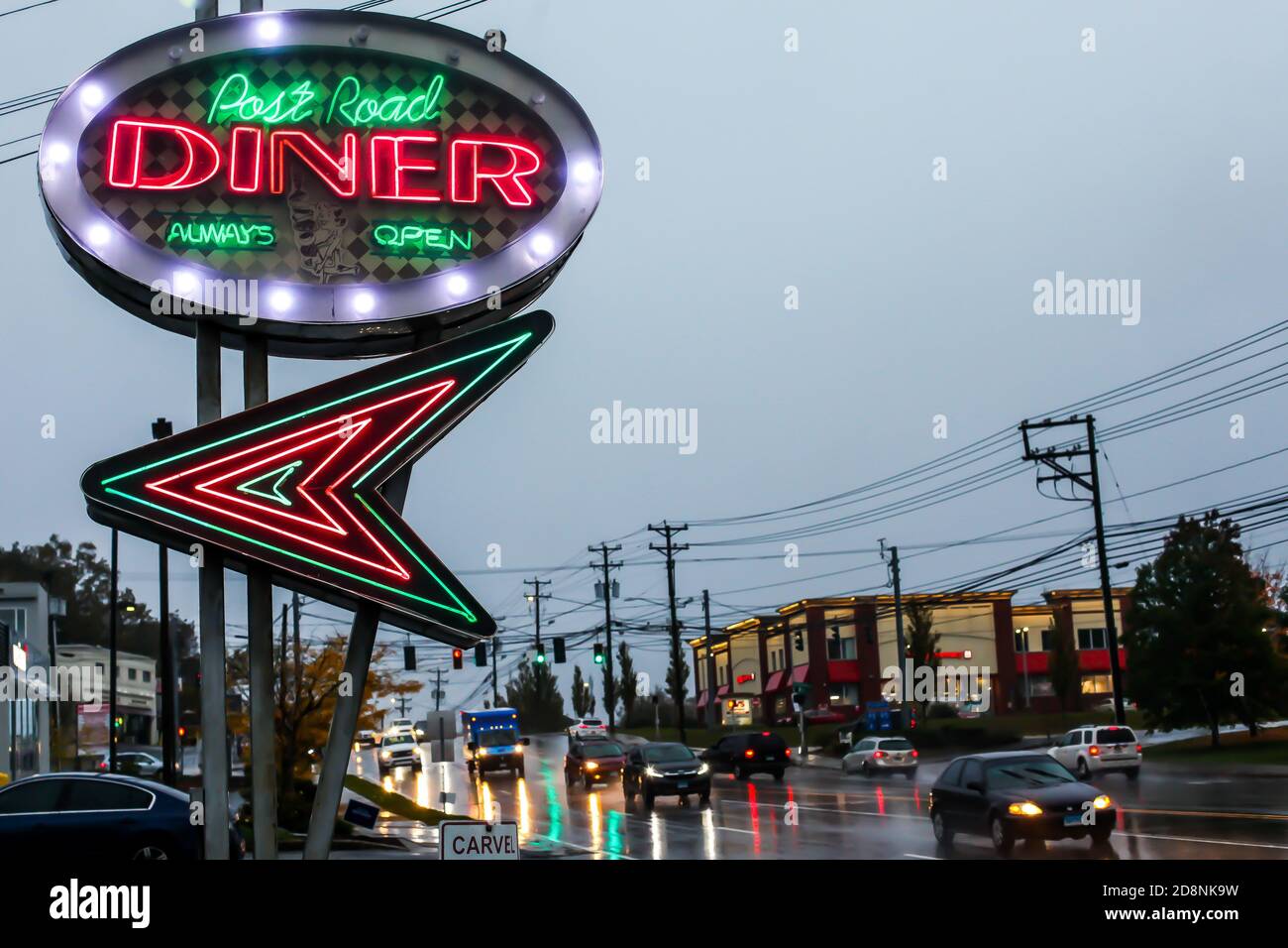 NORWALK, CT, USAOCTOBER 30, 2020 Postal Road Diner in rainy October morning with street