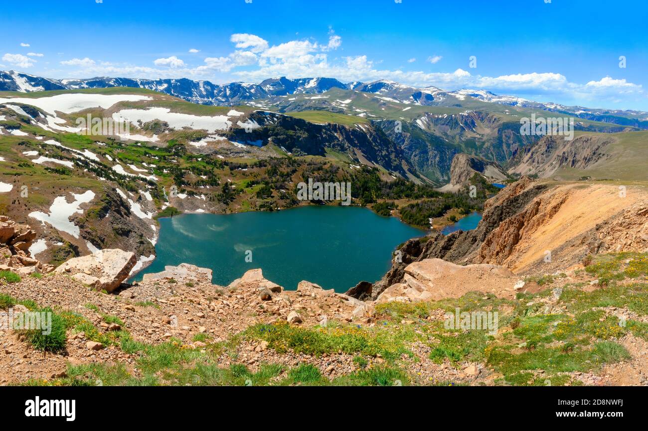 Alpine lake and snowy mountain in high altitude near Yellowstone